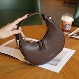 THEMEISLES 2025 popular manufacturer's new Korean niche cowhide crescent bag, underarm bag, semi-round moon bag, one-shoulder portable leather women