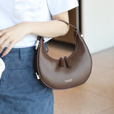 THEMEISLES 2025 popular manufacturer's new Korean niche cowhide crescent bag, underarm bag, semi-round moon bag, one-shoulder portable leather women