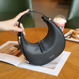 THEMEISLES 2025 popular manufacturer's new Korean niche cowhide crescent bag, underarm bag, semi-round moon bag, one-shoulder portable leather women