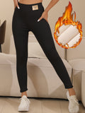 Women's High-Waist Fleece-Lined Leggings - Elegant Black with Butterfly Detail, Stretchy & Warm for Fall/Winter